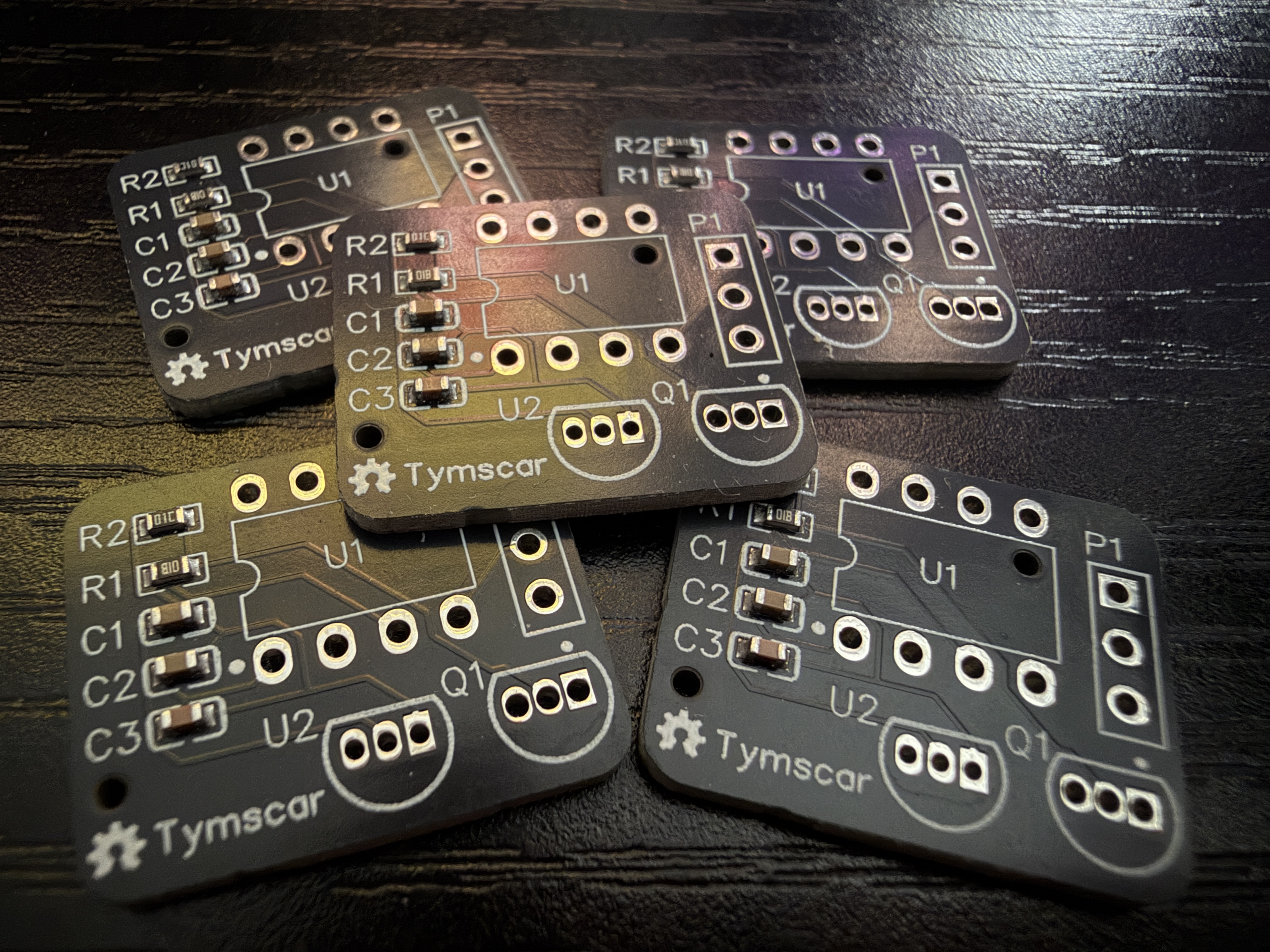 The five boards as they arrived, with the tiny parts already soldered